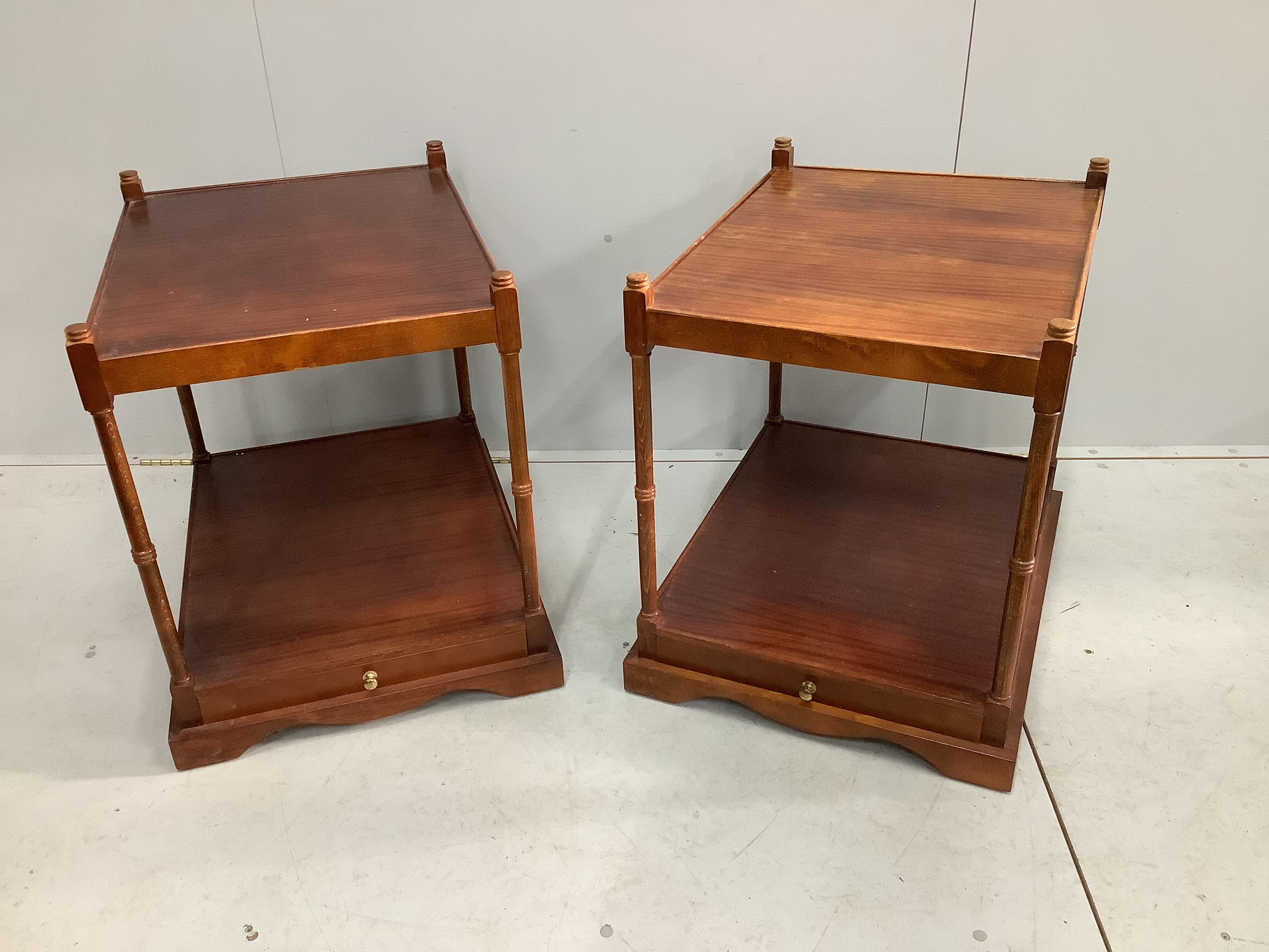 A pair of reproduction mahogany two tier occasional tables, width 52cm, depth 68cm, height 66cm